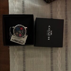 Coach Women’s Watch with Black and Red Star Design